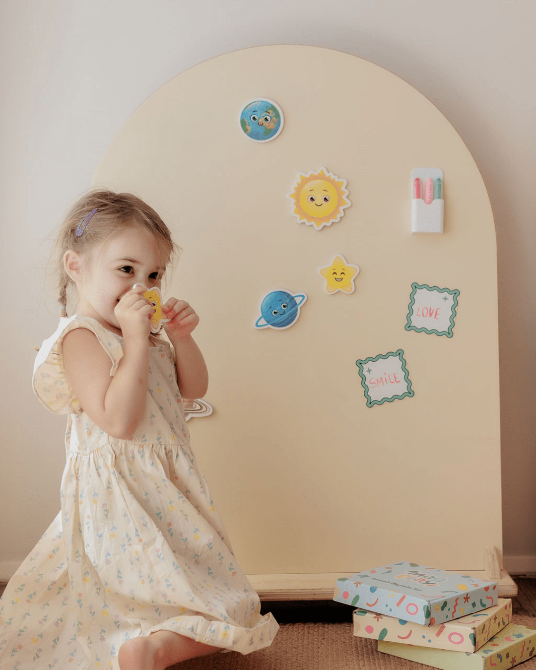 Child playing at the MagPlay Wall + Board + Stand Bundle