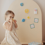 Child playing at the MagPlay Wall + Board + Stand Bundle