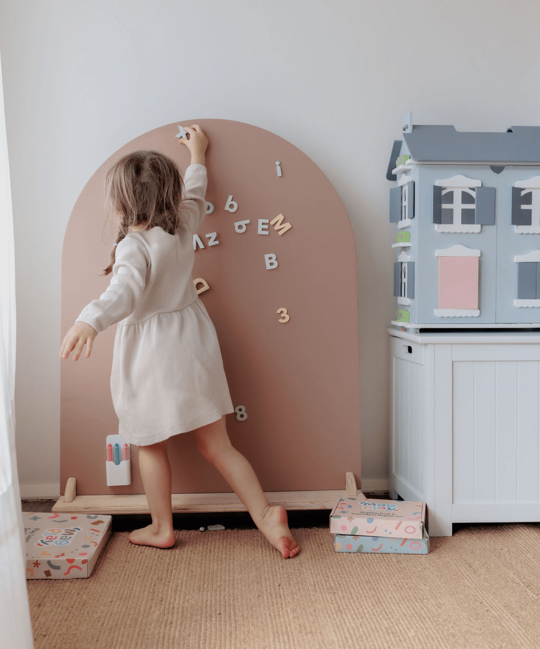 Portable MagPlay magnetic playwall with wooden stand