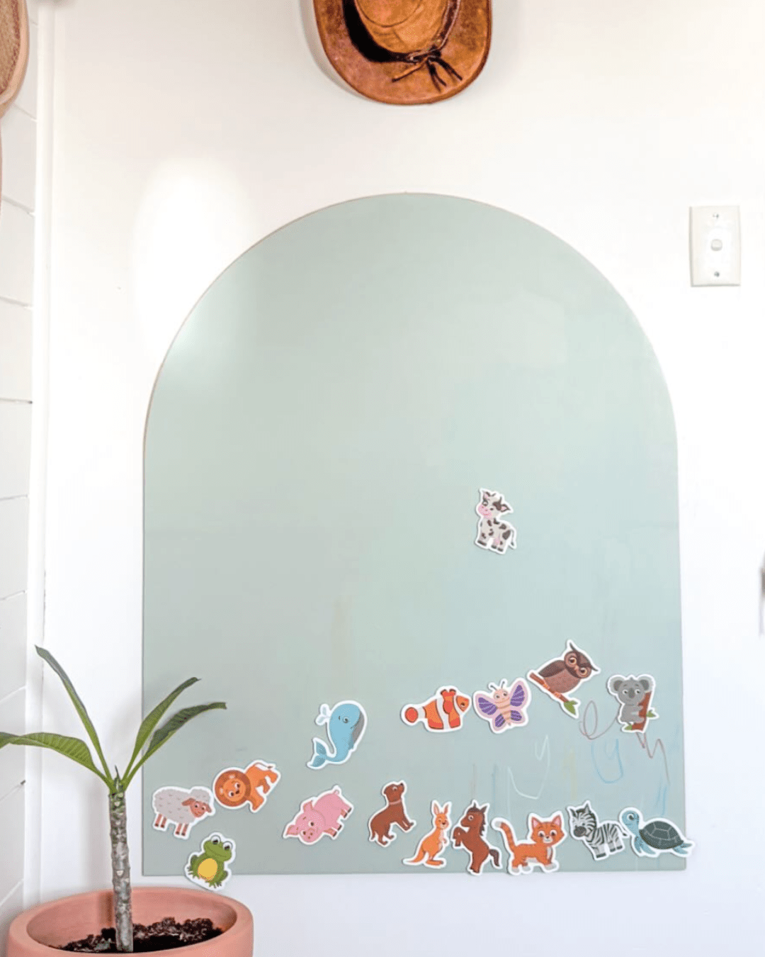 Kids doing screen-free activities on the MagPlay Wall magnetic decal