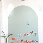Kids doing screen-free activities on the MagPlay Wall magnetic decal